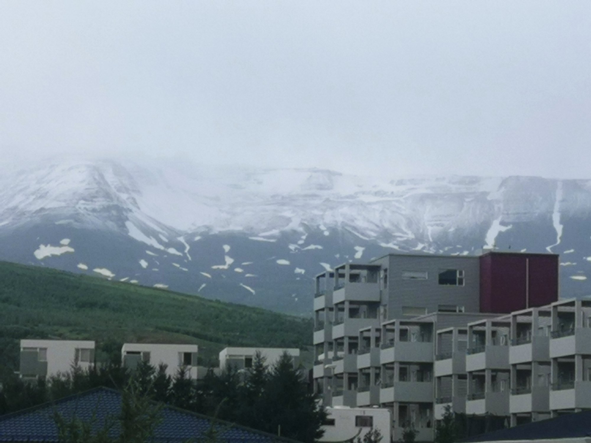 Akureyri in July - Snow in the Mountains