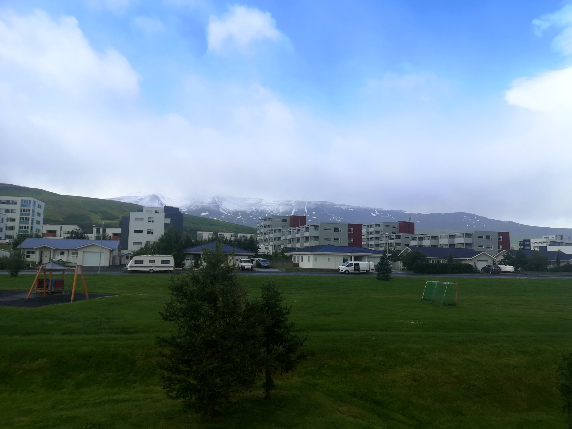 Akureyri in July - Snowy Mountains