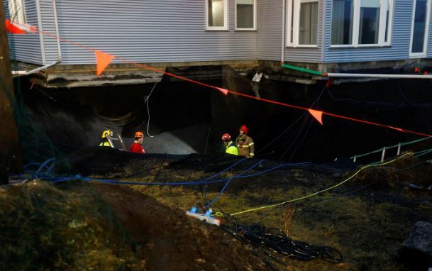 Rescue workers searching for a missing man in a fissure, Grindavík, Iceland